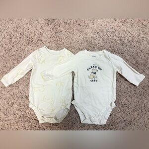 Unworn! Set of two long sleeve onesies. Size 6 months. Puppy/dog themed Carter’s